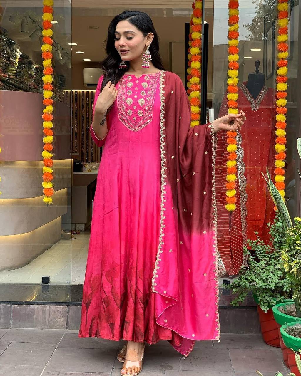 Turn heads in a stunning pink dress that radiates elegance and confidence!